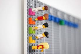 A Wall Mounted Calendar Made From Lego Bricks Lego Calendar Family Planner Lego Wall
