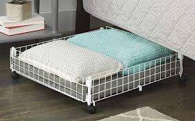 The bed is a regular platform bed with storage space under it where you can place your magazines and books for midnight crisis. These Under Bed Storage Solutions For Shoes More Help You Save Space Spy