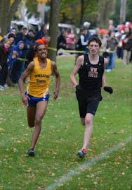 Wheaton North's Emmanuel wins in photo finish