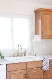 Updating A Kitchen With Oak Cabinets Without Painting Them In 2020 Kitchen Cabinets On A Budget Modern Oak Kitchen Budget Kitchen Remodel