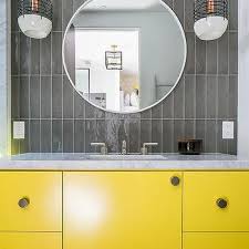 With the spacious storage, this yellow vanity is very suitable for a big family to put the tools massively. Neon Yellow Bath Vanity Design Ideas