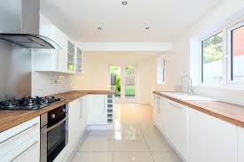 A lot of kitchen design pictures feature spaces with white cabinets and walls. Pin By Alexandra Wiggins On Kitchen Long Narrow Kitchen Kitchen Diner Designs Narrow Kitchen