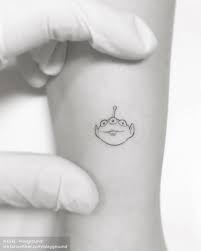 An original design that is sure to please. Toy Story Alien Tattoo Alien Tattoo Tiny Tattoos Unique Tattoos