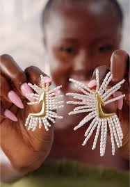 A perfect balance of pearls, gold, and bold design, UVYN is available in  two sizes (Small $75, Large $85). Shop now at www.shopkhoi.com.  International shipping available. Models outfit: @the.owusuwaa