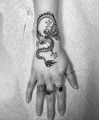 A traditional dragon tattoo can still have many variants, so just imagine how many styles a japanese tattoo can be! Tattoo Uploaded By Tattoodo Dragon Tattoo By Spider Sinclair Dragon Minimalism 515957 Tattoodo