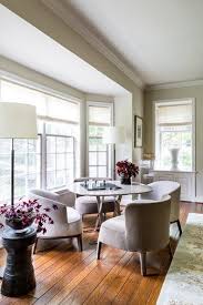 A Living Room Gets A Cozy And Comfortable Makeover Living Room Seating Game Table And Chairs Minimalist Living Room