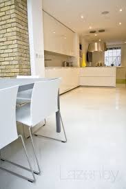 Concrete Doesn T Have To Be Grey As This Stunning Example Of Off White Polished Concrete Displays Kitchen Remodel Inspiration Kitchen Remodel Concrete Floors