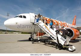 Passengers Boarding A Airplane Looking At The Passengers Boarding The Plane Influenced Me To Ensure That I Can Make An Passenger Aircraft Passenger Jet Engine