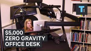 The chairs are available in beige or black colors, and each one comes with an adjustable headrest pillow. 5 000 Zero Gravity Office Desk Youtube