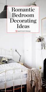 12 Completely Un Cheesy Ways To Create A Romantic Bedroom Cozy Bedroom Lighting Romantic Bedroom Apartment Bedroom Decor