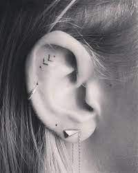16 Tiny Ear Tattoos That Are Perfect For Minimalists Tattoos Tiny Ear Tattoo Neck Tattoo