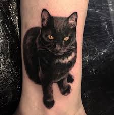 Black And White Cat Tattoo 40 Must See Tattoos For Halloween Temporary Tattoo Blog Black Cat Tattoos Cat Paw Tattoos Cat Tattoo