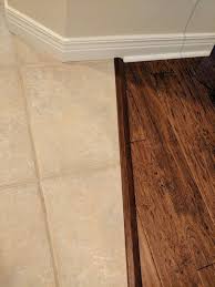 Master shower still needs glass tile looks like chippy from transition between tile and wood floor, source:pinterest.com. Transitioning Hardwood Floor To Tile Floor Is There A Better Way Hometalk