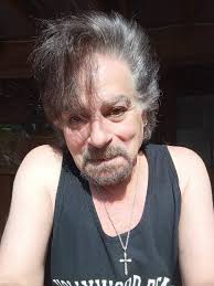 Playing acoustic guitar in basement