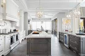 If you have the space, however, you can double the length of the island and the amount of seating. Large Gray And White Kitchen Is Fitted With Two Islands Both Dark Gray Washed Kitchen Remodel Layout Cheap Kitchen Remodel Kitchen Remodel Design