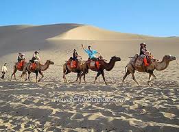 The old bronze statue of camels caravan in uzbekistan, samarkand. History Of China Silk Road Development Significance Travelers