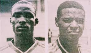 Throwback1980s Leopards linkman, David Akoi manoeuvres past Patrick "Amin"  Omuse and Joel Odhiambo of Kahawa United during a Kenya National Football  League match at the Nyayo Stadium.