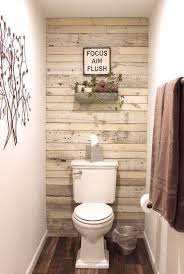 Be the captain of your bathroom with these fun, ship steering wheels. Whitewash Reclaimed Wood White Shiplap Paneling Shiplap Accent Wall Diy Bathroom Decor Bathroom Decor Diy Bathroom