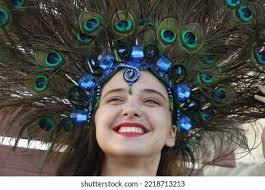 5+ Thousand Girl Peacock Feather Royalty-Free Images, Stock Photos &  Pictures