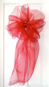 Making A Large Bow With Deco Mesh Christmas Bows Diy Deco Mesh Bows Christmas Mesh Wreaths