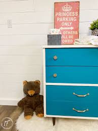 This changing table has six roomy drawers and a topper that keeps changing pads firmly in place. Used Mcm Dresser To Chic Baby Change Table Upcycle Interior Frugalista