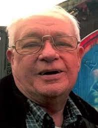 John E. Dougherty Obituary