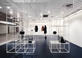 Three Dimensional Grid Of White Steel Cubes At This Boutique In Osaka Shop Interiors Retail Design Retail Furniture