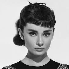 Leaving the front sections of hair and bangs alone (clip them out of the way if it's easier), spray the roots on the top and crown of your head. Audrey Hepburn Hair Colour Hairstyle Timeline Beauty Crew