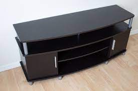 This unit is just over 47 inches long, 20 inches tall, and 16 inches deep, and it can only support up to 66 pounds. The 6 Best Tv Stands Of 2021