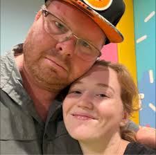 Adult hooded Bluey blanket with arm holes and pockets