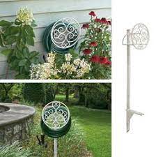 Get it as soon as wed, may 26. Free Standing Garden Hose Holder Stand Decorative Hanger