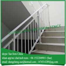 The fluted newel post painted similarly to the railings also gives it a timeless look. China Staircase Handrail Design For Ethiopia Market Global Sources