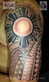 Filipino tribal sun tattoo on left half sleeve. Awesome Filipino Tattoo On Right Half Sleeve
