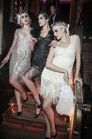 Featuring The Icon In Silver And Bone Plus The Artist Gown In Jet Black Gatsby Party Outfit Roaring 20s Fashion Gatsby Party Dress