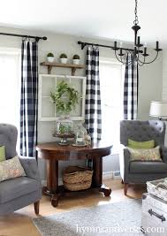 Cream walls and patterned curtains 50 Best Farmhouse Living Room Decor Ideas And Designs For 2021