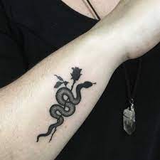 36 Best Snake And Flower Tattoo Designs Meanings Petpress Small Snake Tattoo Snake Tattoo Design Snake And Rose Tattoo