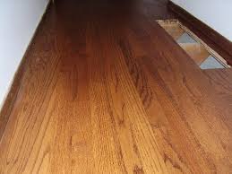 We use any of minwax's oil base stains for a custom color charge of $100 per project. Red Chestnut Minwax Novocom Top