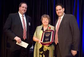 Excalibur & Excelsior: Paul Logli, Children's Home + Aid win awards