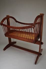 Simple Wooden Baby Cradle With Natural Brown Color Scheme From The Wood Element And Small Spoke Style Cradle Fences For F Bebek Odasi Mobilya Koltuklar Mobilya