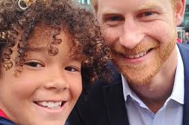 Young fan adds Harry and Meghan to royal photograph collection