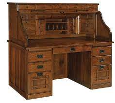 Choose from elaborate designs with plenty of drawers and storage space, or keep things simple with a more contemporary model. History Of The Roll Top Desk Timber To Table