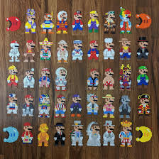 I Did All The 8bit Costumes From Super Mario Oddyssey Http Ift Tt 2dbv501 Perler Bead Mario Hama Beads Mario Perler Bead Art