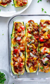 Out Of Oven Cooked Zucchini Boats With Ratatouille Stuffing Of Summer Squash Bell Pepper Zucchini Eggplant T Cooking With Fresh Herbs Recipes Easy Zucchini