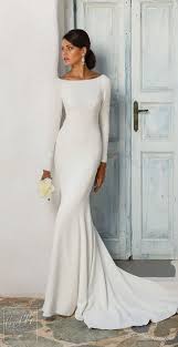 Simple Wedding Dresses Inspired By Meghan Markle Long Sleeve Wedding Dress By Justin Ale Cowl Back Wedding Dress Sleek Wedding Dress Wedding Dress Silhouette