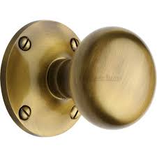 Picture shows the lever lock handle. Large Victorian Bun Mortice Door Knobs On Rose In Antique Brass From Cheshire Hardware Door Handles Door Accessories Cheshire Hardware