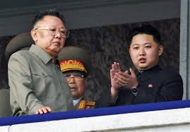 Workers carry bundles of canvas on the . North Korean Leader Kim Jong Il 69 Has Died Wcfcourier Com