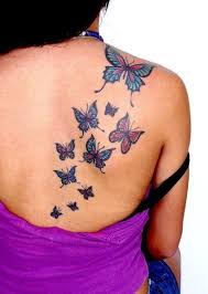 Just alter the design, maybe incorporate skulls. Three Butterfly Tattoos On Right Back Shoulder For Women