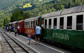 The locomotive had collided with a fallen tree lying on the tracks and fell over the embankment into the mur, which ran next to it. Murtalbahn Global Grey Nomads