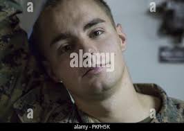 U.S. Marine Corps Cpl. Taylor Burrows, H1 flight line mechanic, teaches  high school students about the AH-1Z Cobra during a demonstration at  Mountain Pointe High School, Ahwatukee, Ariz., Sept. 8, 2015. Marine