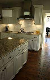 White kitchen cabinets with granite brown hardwood floors. 99 Fascinating Kitchen Backsplash Decoration Ideas For Your Kitchen Brown Granite Countertops Granite Kitchen Kitchen Renovation